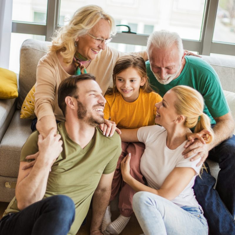 Our pride and joy. Portrait of three generations of family relaxing together at home.