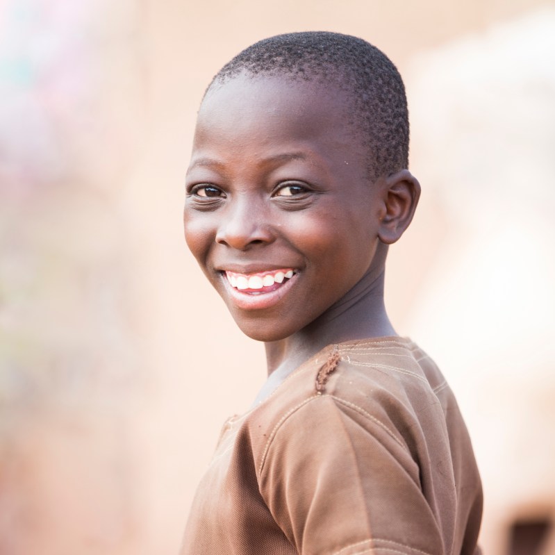 african kid turning and smiling african kid turning and smiling